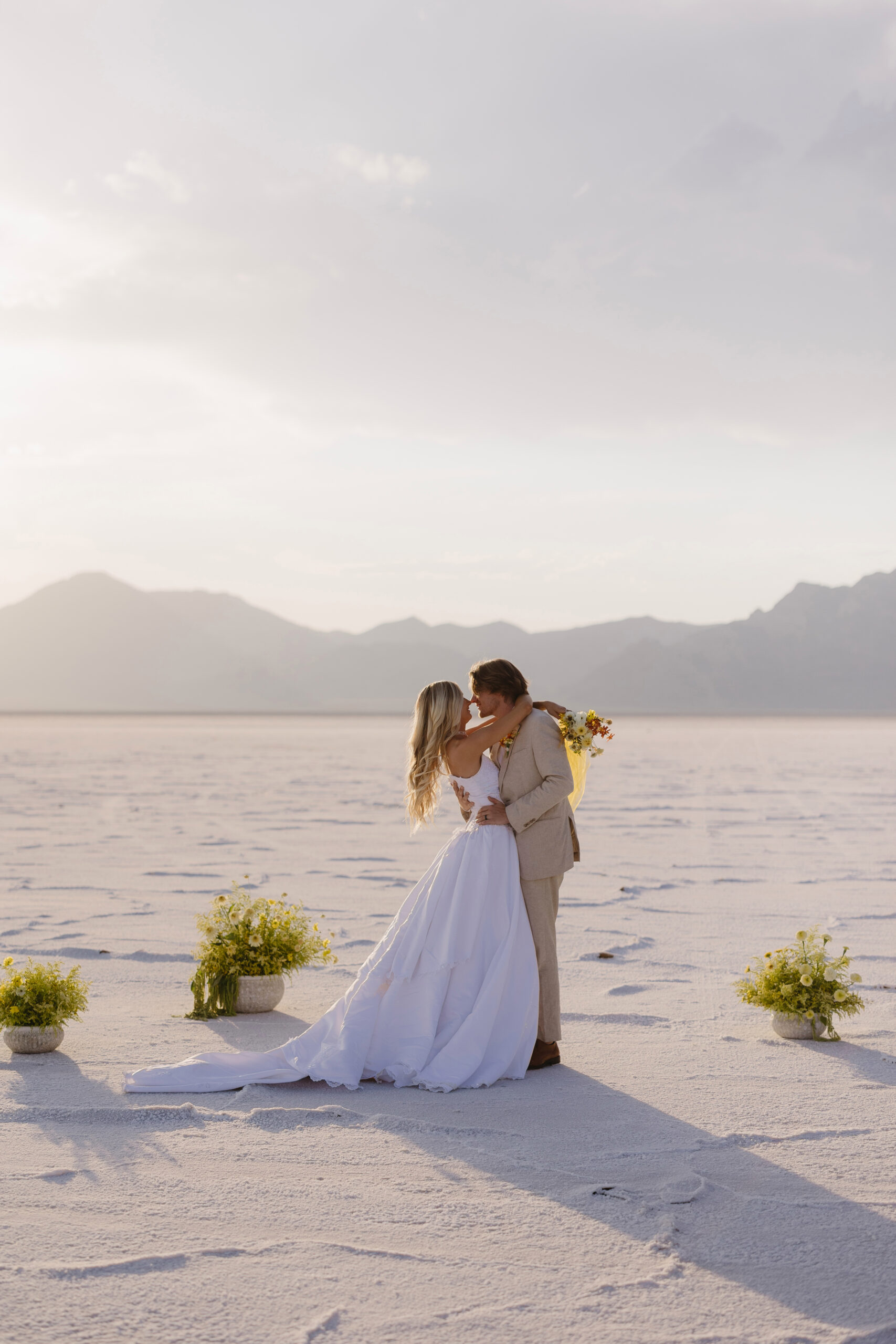Bride and Groom kissing on the Salt Flats in Utah