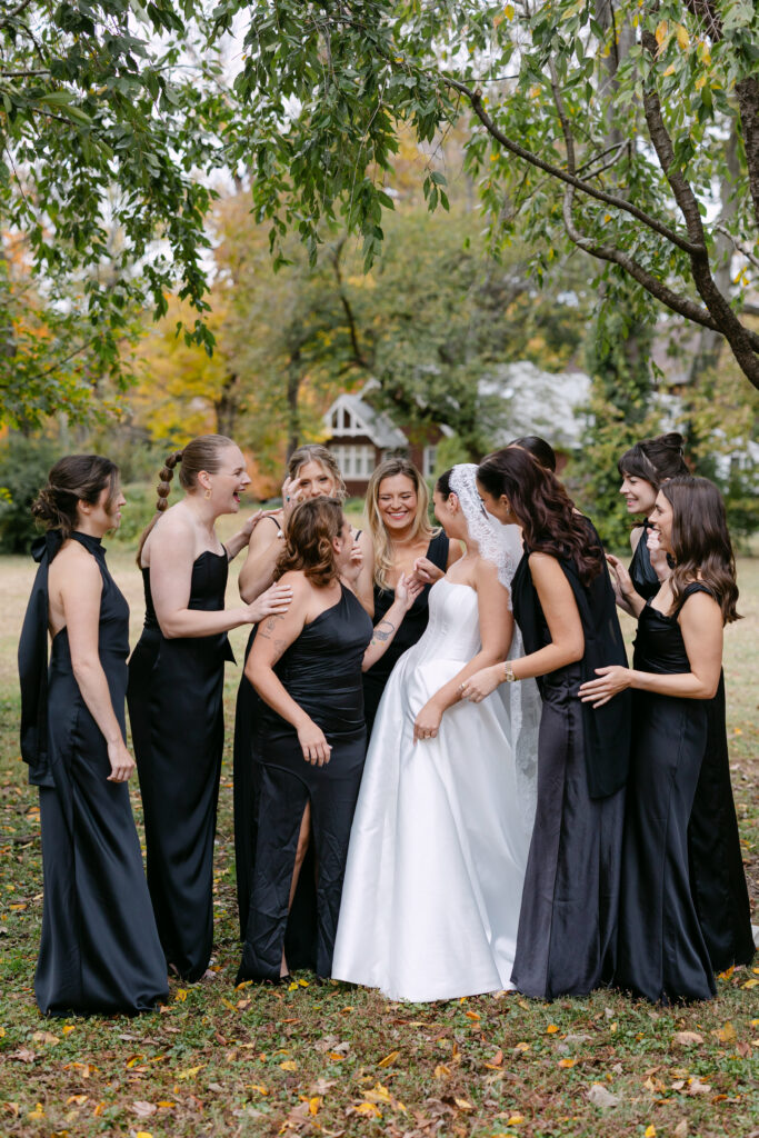 Bridesmaids laughing together during wedding morning at Peterson Dumesnil House in Louisville KY