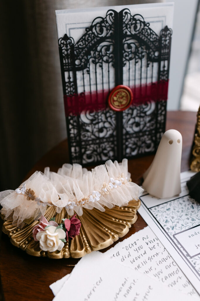 Phantom of the Opera wedding stationery with romantic vintage details at a Louisville Palace wedding in Louisville Kentucky