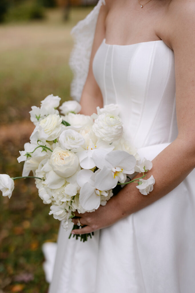 Classic white bridal bouquet with elegant florals at Peterson Dumesnil House wedding in Louisville