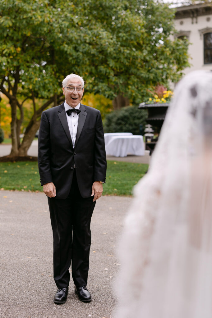 Emotional first look between bride and father at Peterson Dumesnil House wedding in Louisville KY