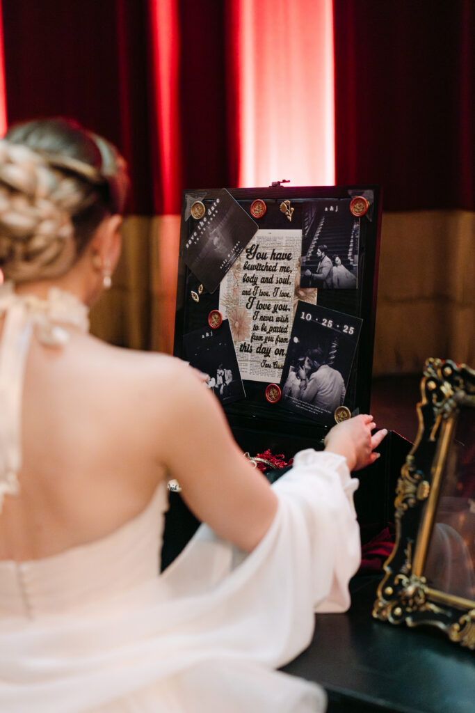 Groom’s thoughtful wedding gift to bride captured during a romantic Louisville Palace wedding morning in Louisville KY