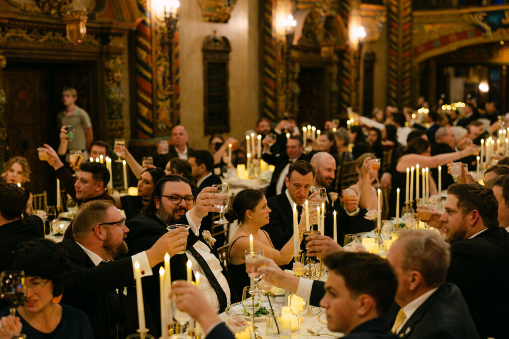 Guests seated at reception tables during an elegant Louisville Palace wedding in Louisville Kentucky