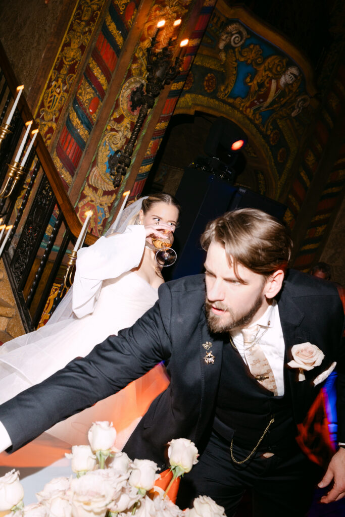 Candid moment of bride and groom before dancing begins at their Louisville Palace wedding reception in Louisville KY