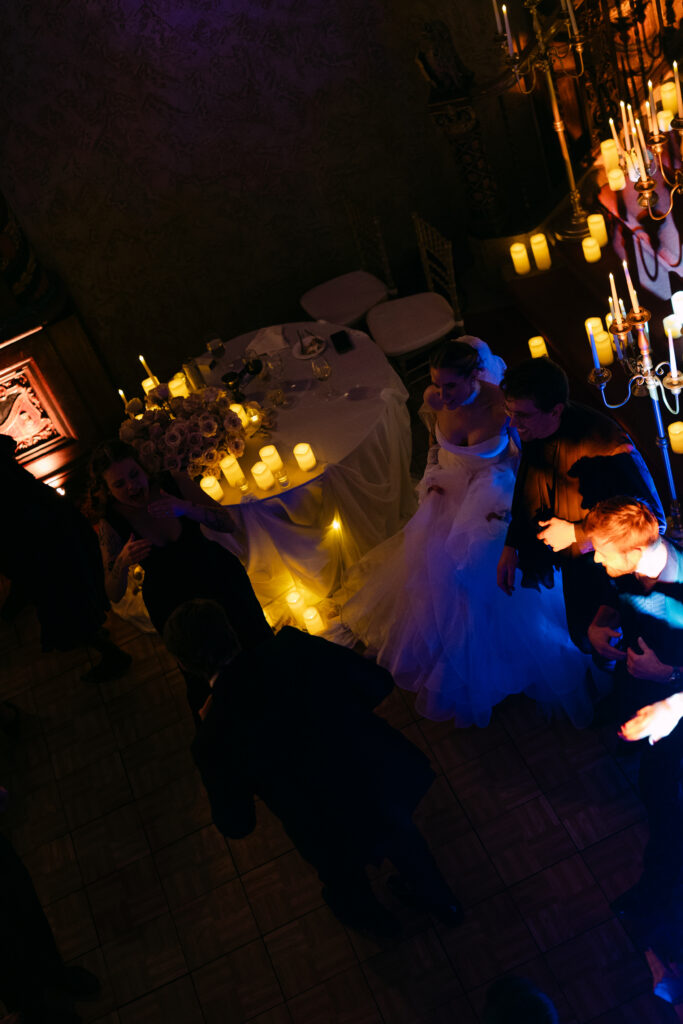 Aerial view of packed dance floor during high-energy Louisville Palace wedding reception in Louisville Kentucky