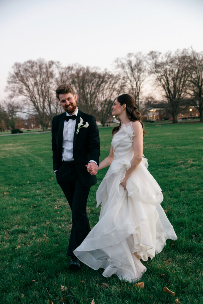 Bride and groom sunset portraits on the front lawn of The Olmsted wedding venue in Louisville Kentucky
