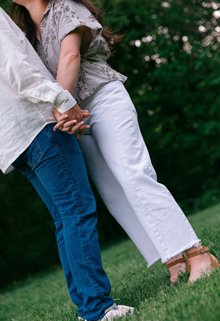 Golden sunlight shining through the treeline during a Cherokee Park engagement session